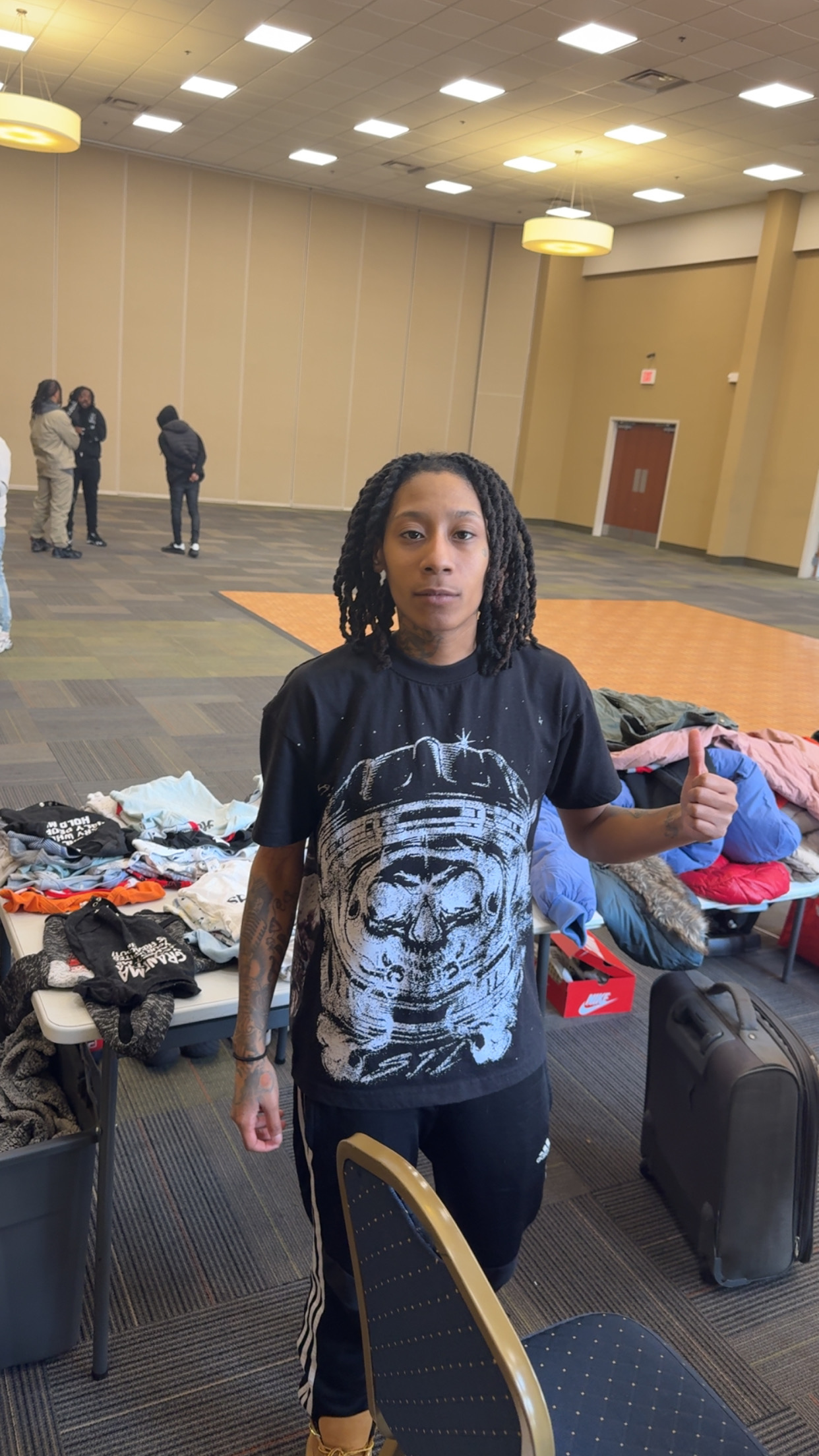 Sorting donated clothing for families